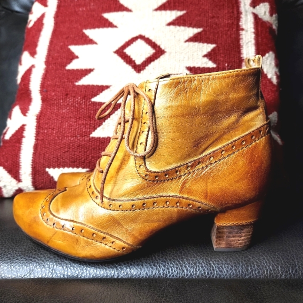 Brown Lace Up Boots with Intricate Brogue Detailing and Polished Leather
